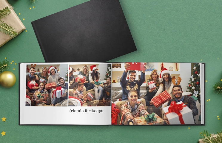 Leather Personalised Photo Books by Printerpix|Custom Printerpix photo book with leather cover and personalised design|Custom made photo album open on table with photo collage of family photos|Wedding and bride photos in custom printed photo album by Printerpix|Couple look at leather cover custom photo book made by Printerpix|Old couple print large custom photos in leather photo album book|||||