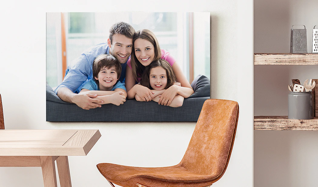 Range of sizes of personalised canvas prints by Printerpix on wall