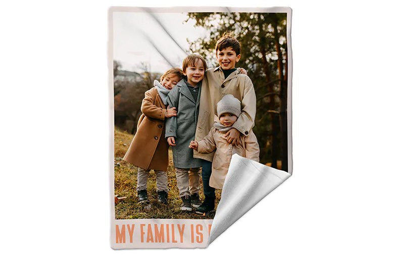 Personalised fleece blanket on sofa