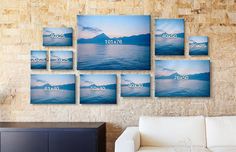 Picture collage of holiday photos on canvas print hung on wall