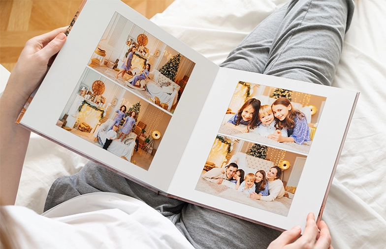 Personalised photo album book with romantic pictures of a couple and photo cover