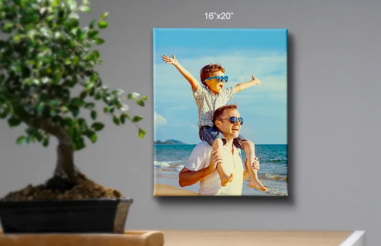 16x20 canvas of child on father's shoulders