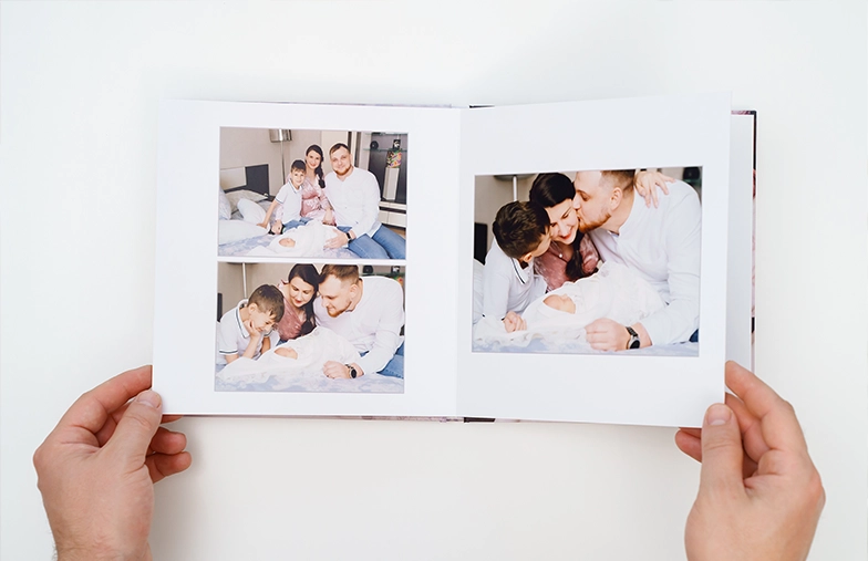 Family photo album with custom printed cover and family name text